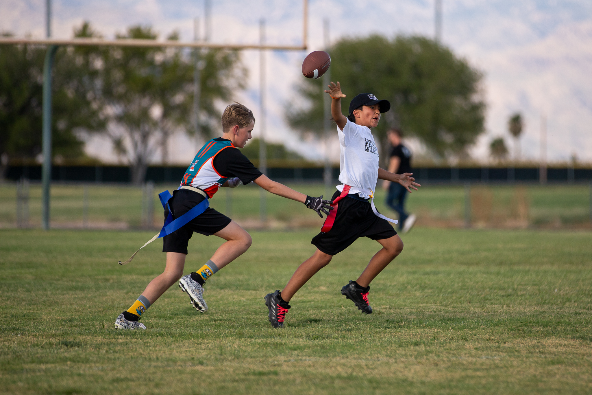 A Vesey player tosses the ball as a Gale player reaches for his flag