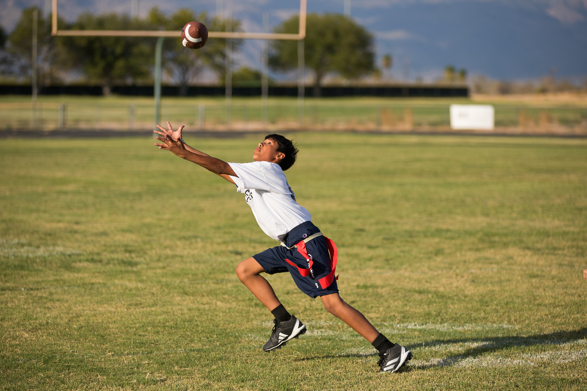 A Vesey player dives for the football